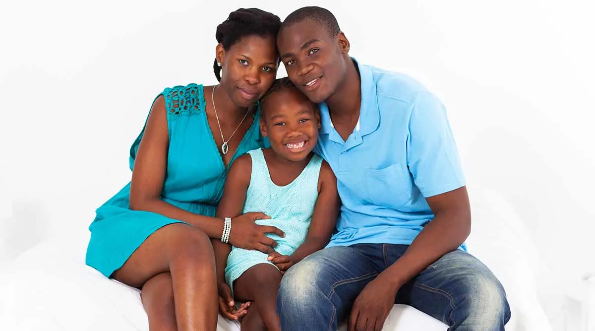 family of three on a couch