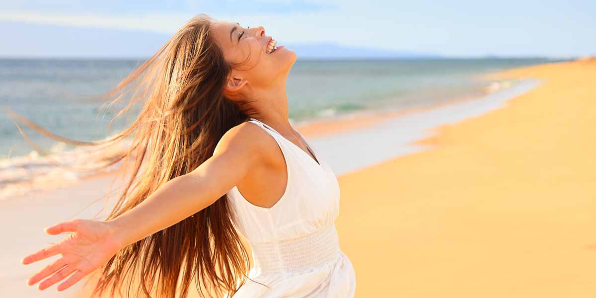 happy woman on a beach