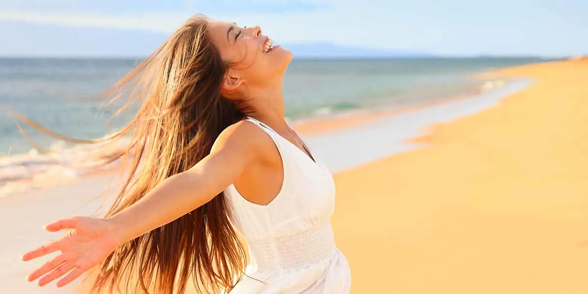 happy woman on a beach