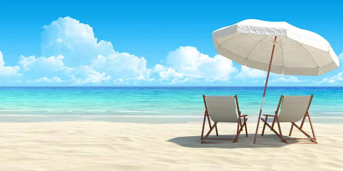 calm beach with umbrella