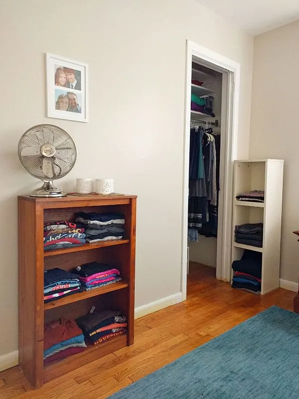 our closet at home with clothes