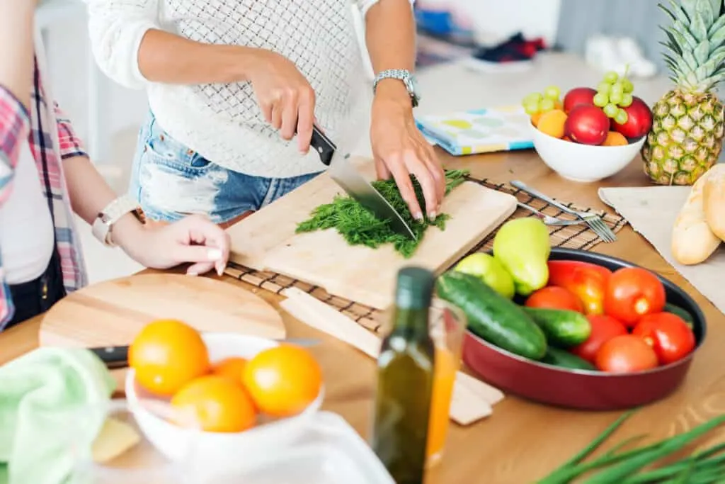 women preparing healthy food