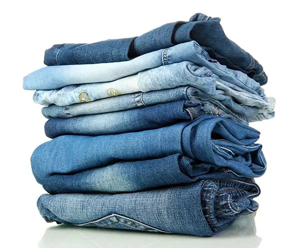 pile of 8 jeans