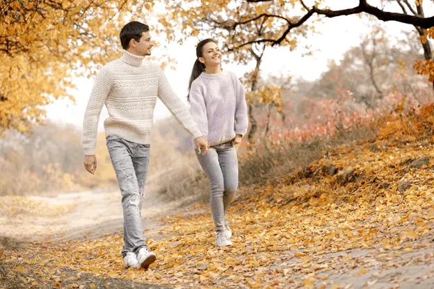 couple walking in forest