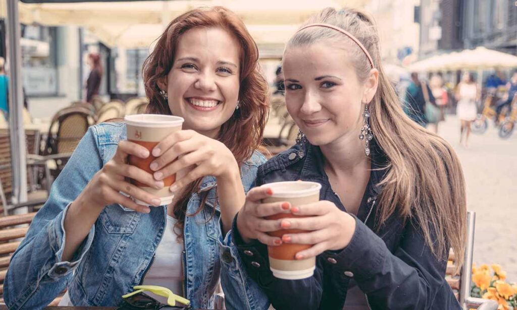 two female friends having coffee