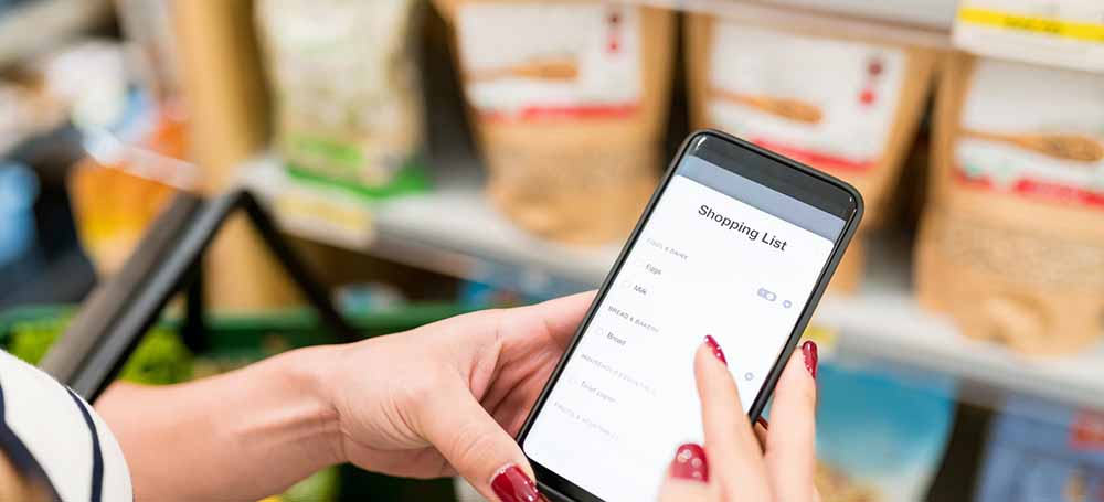 cheap grocery list on a smartphone at the store