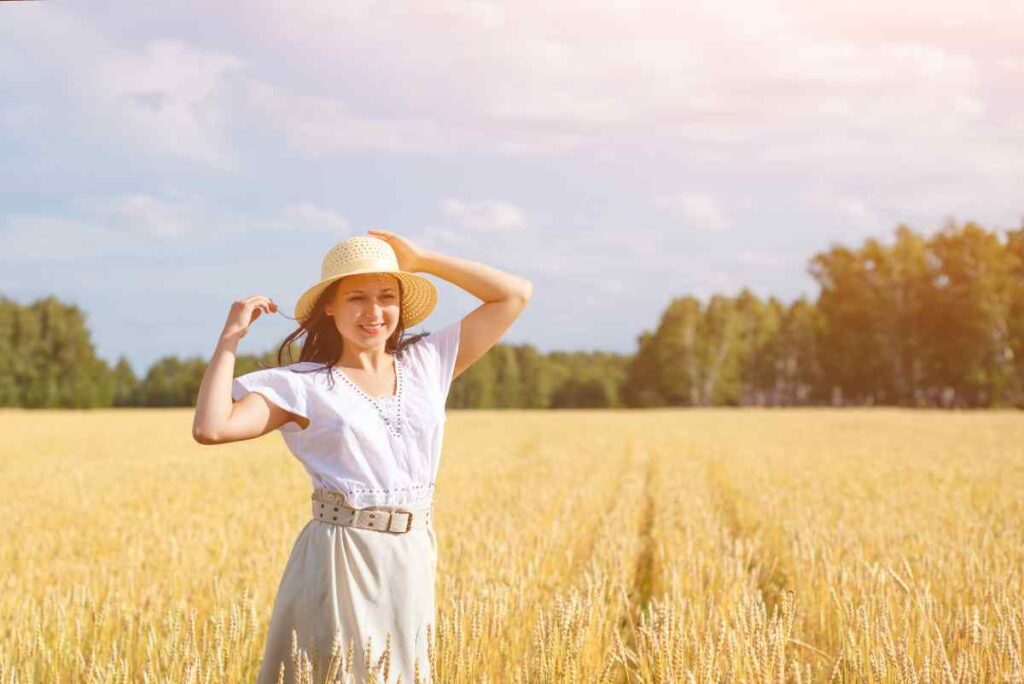 mom in a field with a great outfit