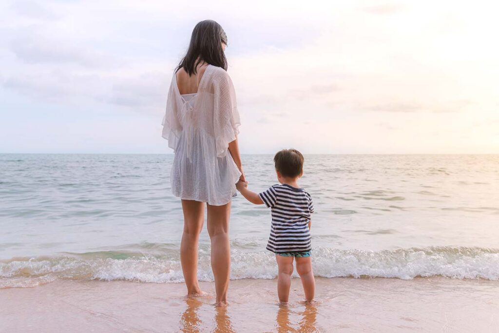 mom and son at the beach