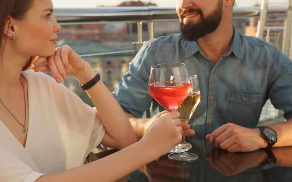 couple talking at a bar