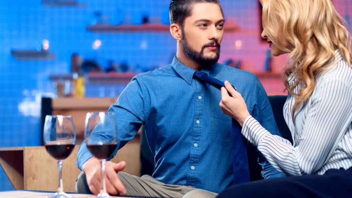 couple drinking on couch