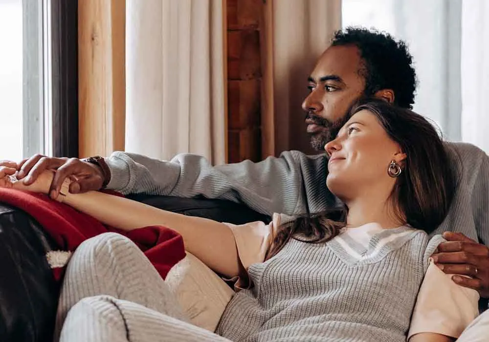 couple talking on the couch