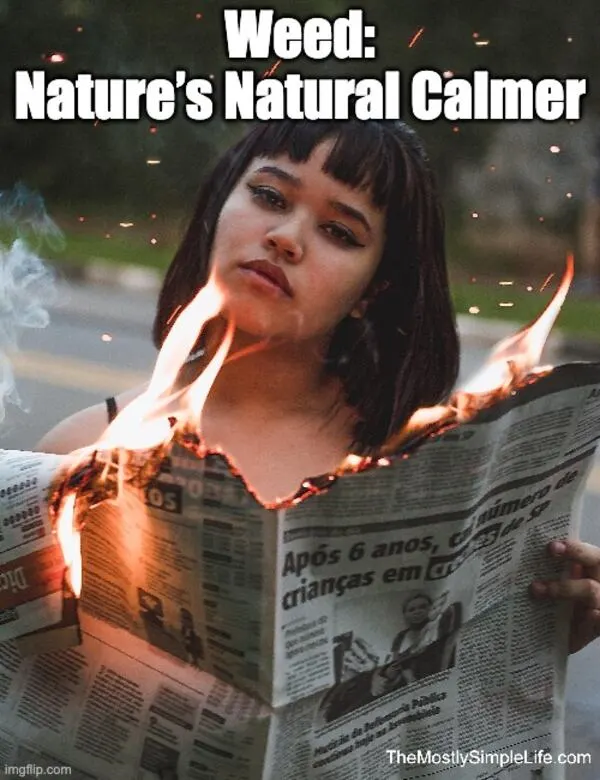 Girl with burning newspaper.