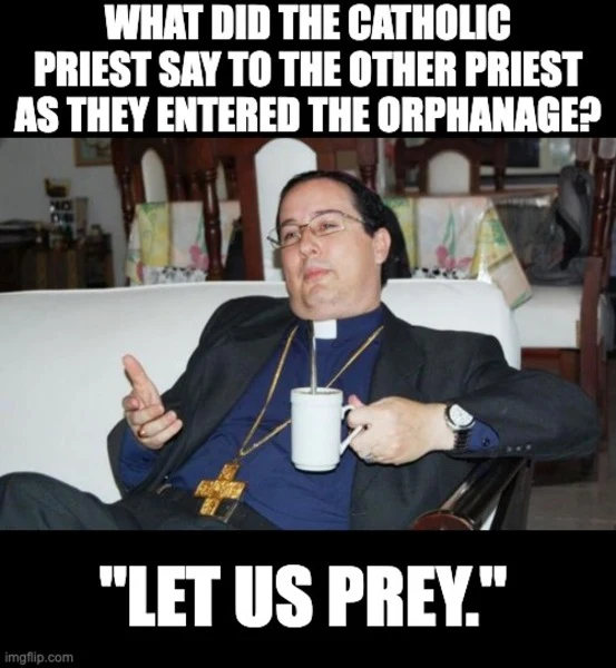 Priest sitting down with mug. 